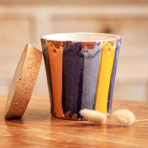 Image illustrative de l'article "Bougie 10cm Bergamote – rayure bleu orange"